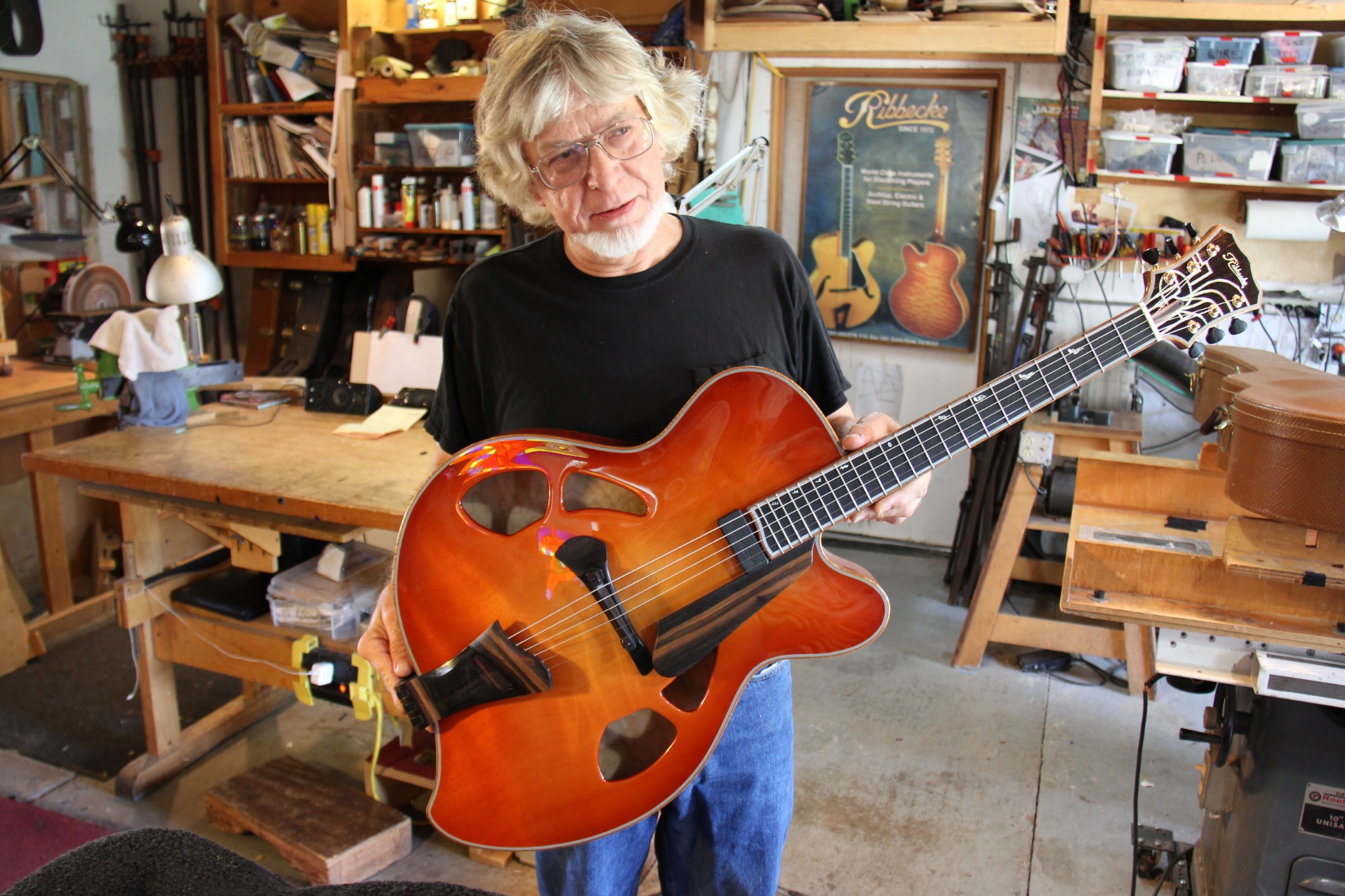 Tom Ribbecke with one of his archtop guitars