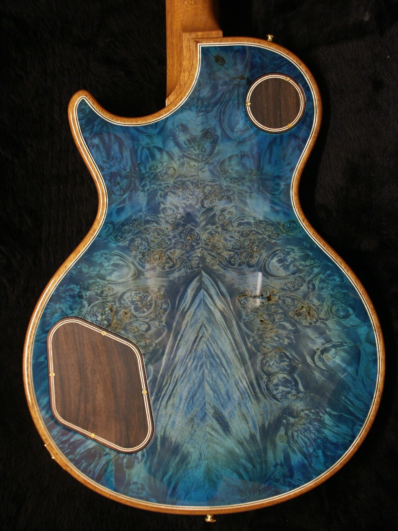 Burled-maple back inlay and Brazilian rosewood backplates