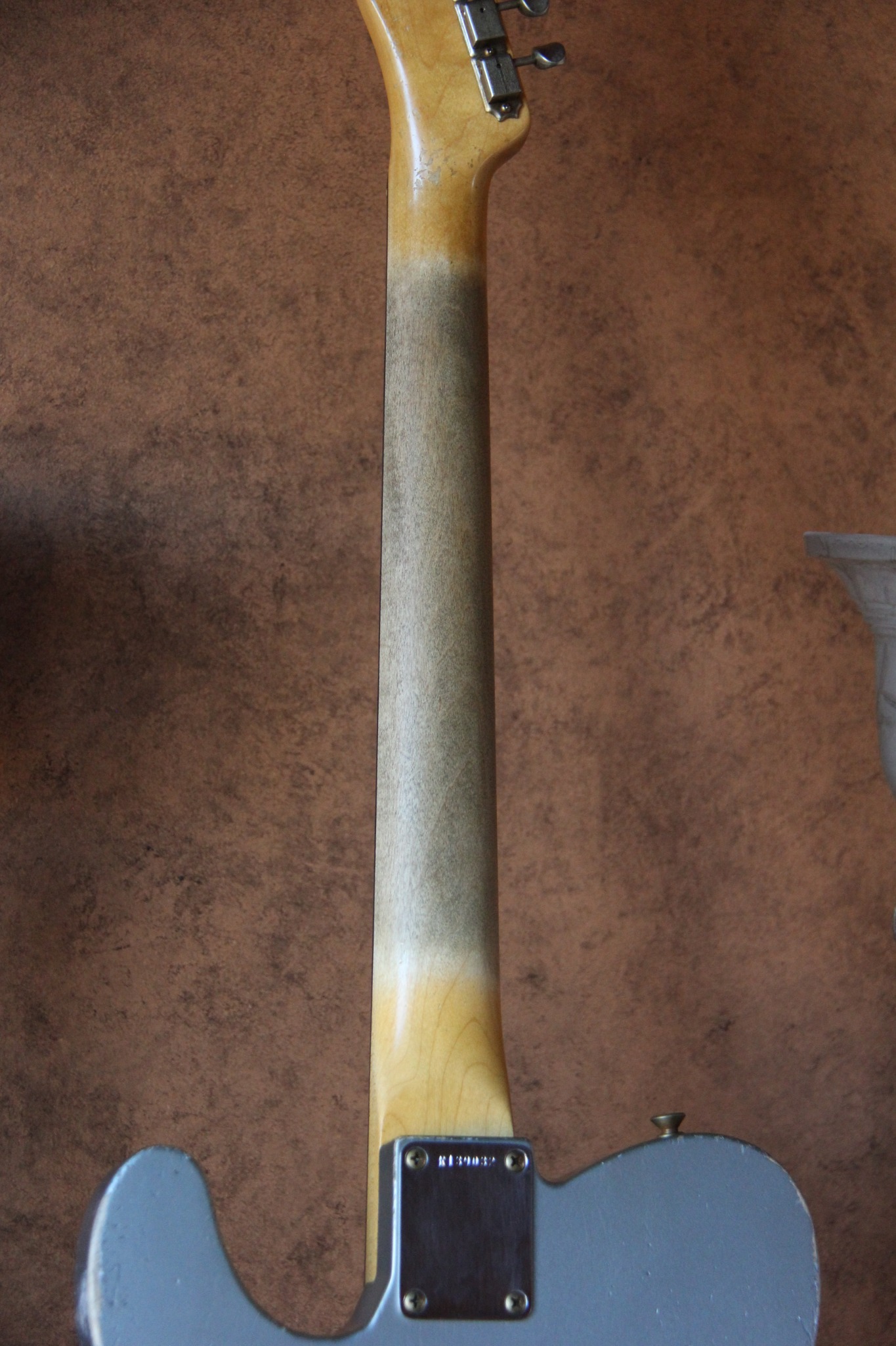 Worn-in back-of-neck treatment
